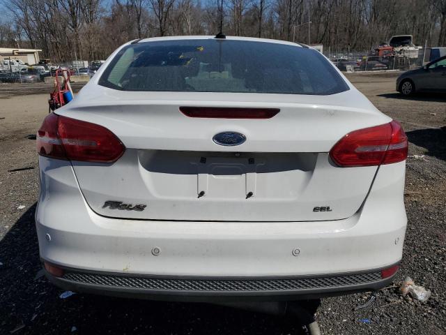 Снимка 6 от търг – 2017 FORD FOCUS SEL с VIN 1FADP3H22HL331523