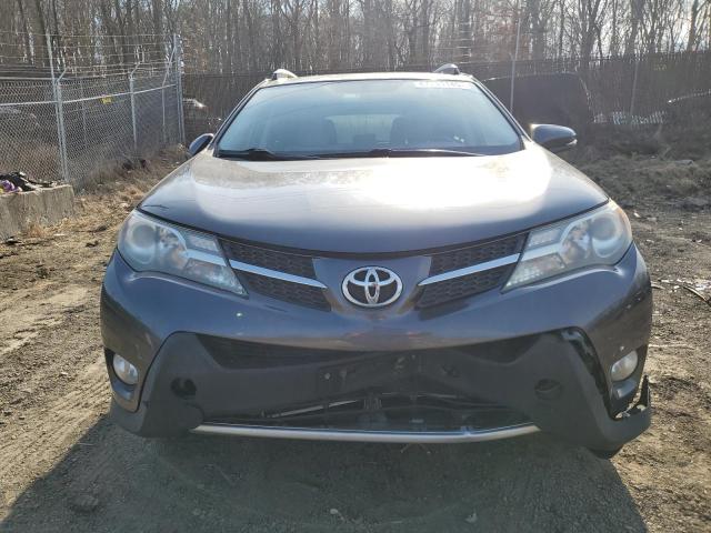 Photo 5 from auction – 2015 TOYOTA RAV4 XLE with VIN JTMRFREV9FJ028199