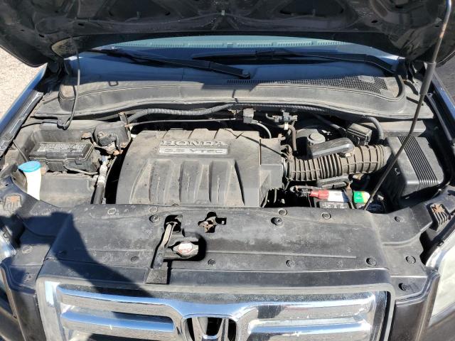 Photo 12 from auction – 2006 HONDA PILOT EX with VIN 2HKYF184X6H520393