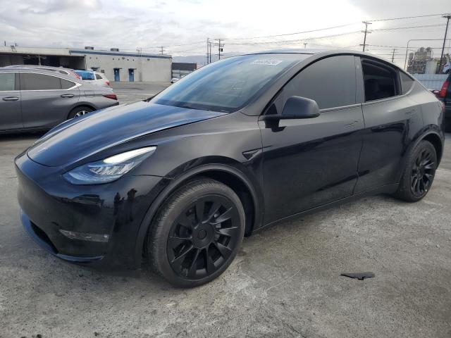 TESLA MODEL Y 2023 with VIN 7SAYGDEE0PA026426 - Photo from auction