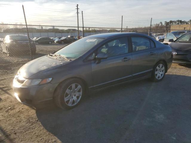 HONDA CIVIC LX 2011 with VIN 19XFA1F51BE000924 - Photo from auction