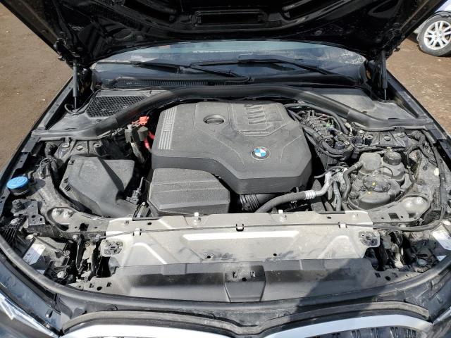 Снимка 11 от търг – 2023 BMW 330XI с VIN WBA83FF04PFN31386