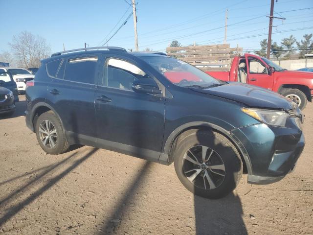 Photo 4 from auction – 2017 TOYOTA RAV4 XLE with VIN JTMRFREV9HJ134607