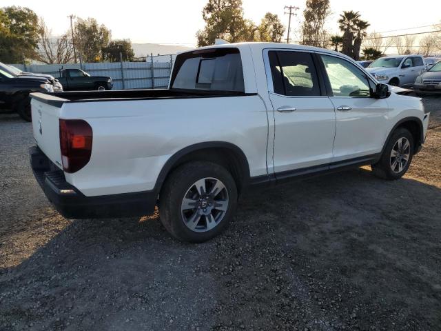 Photo 3 from auction – 2019 HONDA RIDGELINE with VIN 5FPYK3F71KB019025