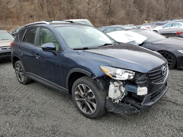 Снимка 4 от търг – 2016 MAZDA CX-5 GT с VIN JM3KE4DY2G0909344