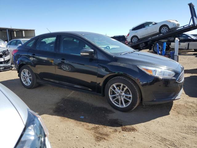Снимка 4 от търг – 2015 FORD FOCUS SE с VIN 1FADP3F25FL380036