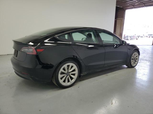 Снимка 3 от търг – 2022 TESLA MODEL 3 с VIN 5YJ3E1EA1NF370565