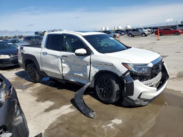 Photo 4 from auction – 2022 HONDA RIDGELINE with VIN 5FPYK3F72NB018843