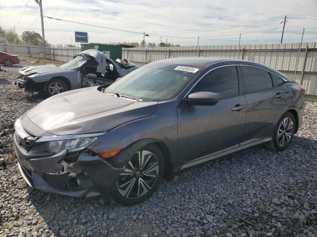 HONDA CIVIC EX 2016 with VIN 19XFC1F41GE031356 - Photo from auction