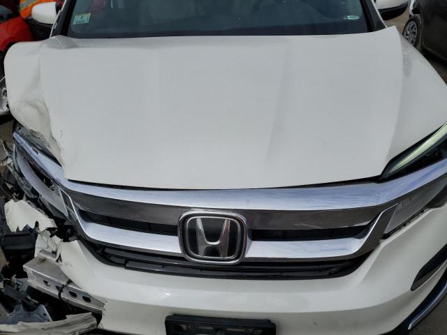 Photo 12 from auction – 2019 HONDA PILOT ELIT with VIN 5FNYF6H04KB036643