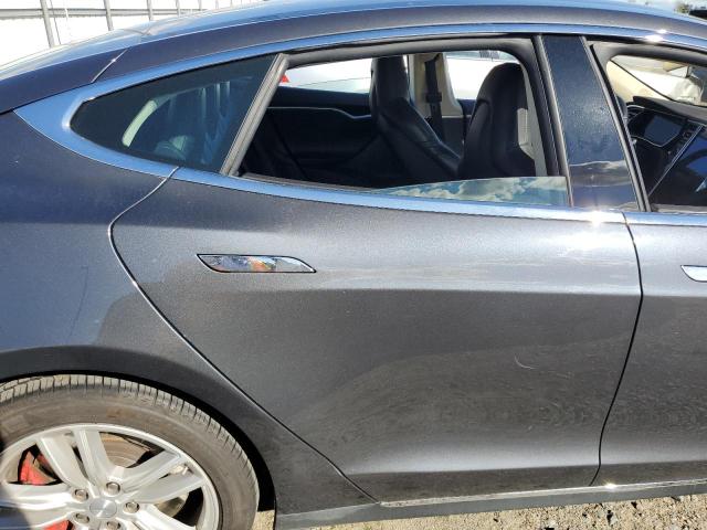 Снимка 10 от търг – 2015 TESLA MODEL S с VIN 5YJSA1E46FF116319
