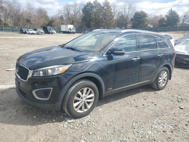 KIA SORENTO LX 2016 with VIN 5XYPGDA32GG168351 - Photo from auction