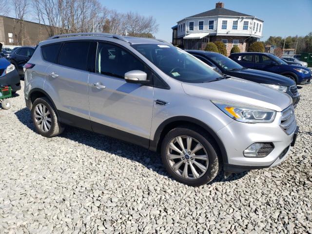 Photo 4 from auction – 2017 FORD ESCAPE TIT with VIN 1FMCU9JD4HUC57993