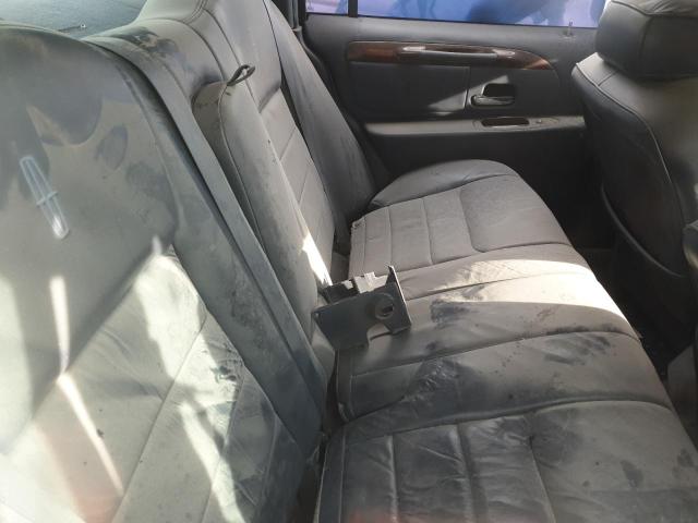 Photo 11 from auction – 2000 LINCOLN TOWN CAR E with VIN 1LNHM81W3YY824379