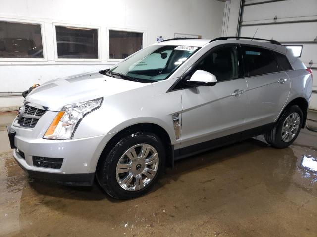 CADILLAC SRX 2012 с VIN 3GYFNGE35CS585317 - Снимка от търг