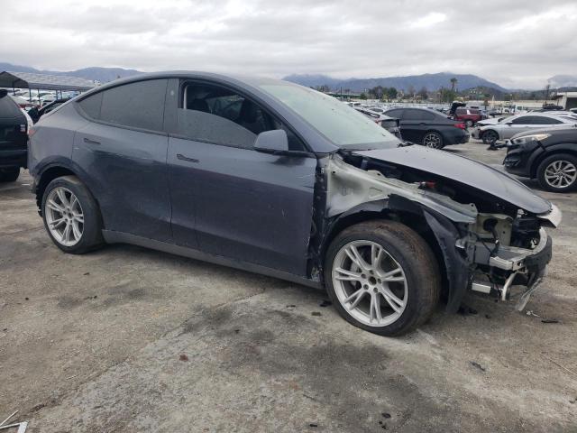 Photo 4 from auction – 2023 TESLA MODEL Y with VIN 7SAYGDED1PF956023