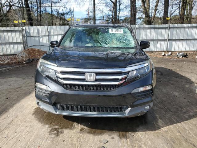 Photo 5 from auction – 2018 HONDA PILOT ELIT with VIN 5FNYF6H0XJB012796