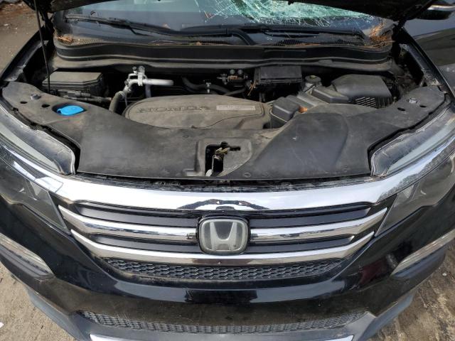 Photo 12 from auction – 2018 HONDA PILOT ELIT with VIN 5FNYF6H0XJB012796