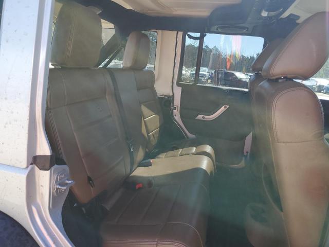 Photo 10 from auction – 2011 JEEP WRANGLER U with VIN 1J4BA5H13BL562938