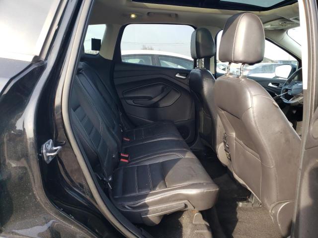 Photo 11 from auction – 2017 FORD ESCAPE TIT with VIN 1FMCU9J98HUA02131