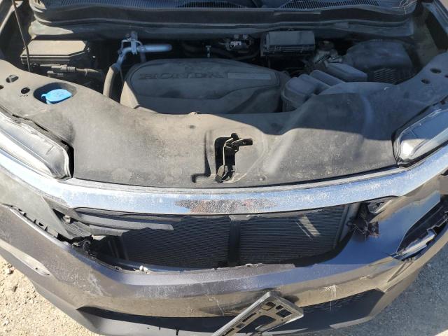 Снимка 12 от търг – 2016 HONDA PILOT EXL с VIN 5FNYF6H55GB112759