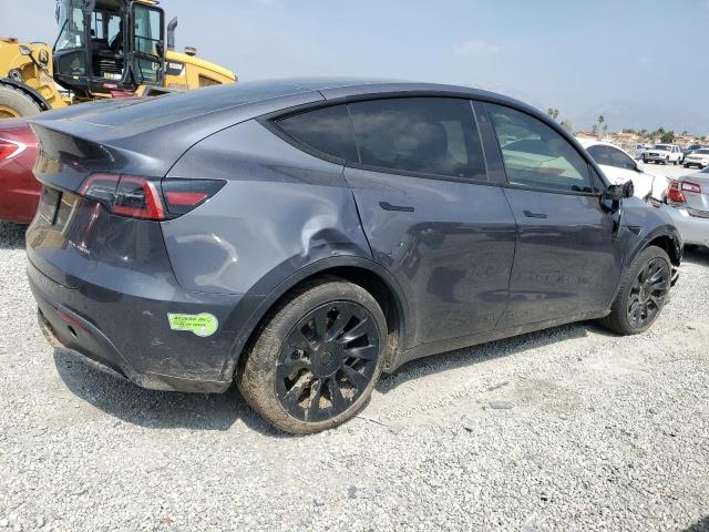 Снимка 3 от търг – 2023 TESLA MODEL Y с VIN 7SAYGDEE9PF624212