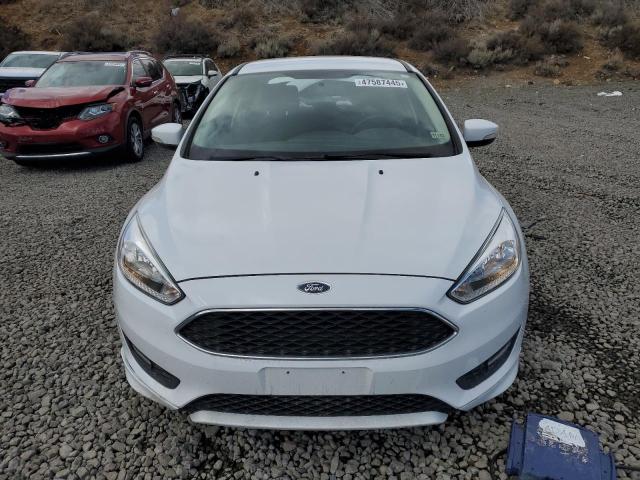 Photo 5 from auction – 2016 FORD FOCUS SE with VIN 1FADP3F21GL397479