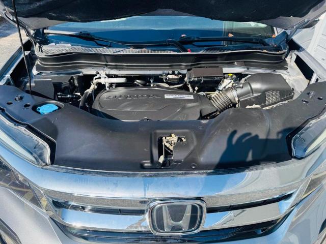 Photo 7 from auction – 2020 HONDA PILOT EX with VIN 5FNYF5H38LB001710