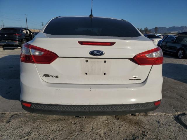 Снимка 6 от търг – 2014 FORD FOCUS SE с VIN 1FADP3F23EL327902