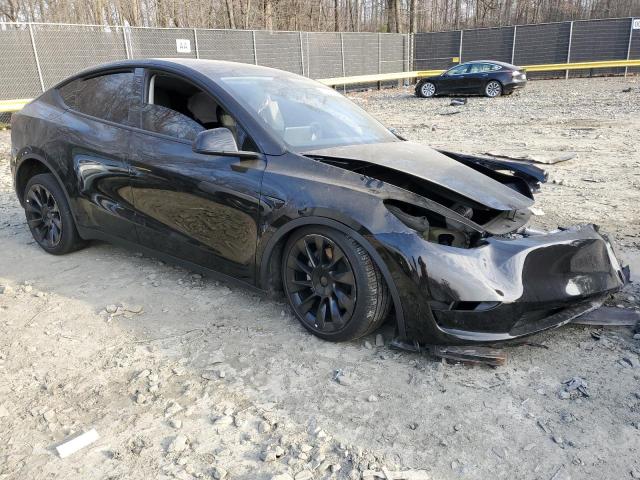 Photo 4 from auction – 2023 TESLA MODEL Y with VIN 7SAYGDEE1PF693055