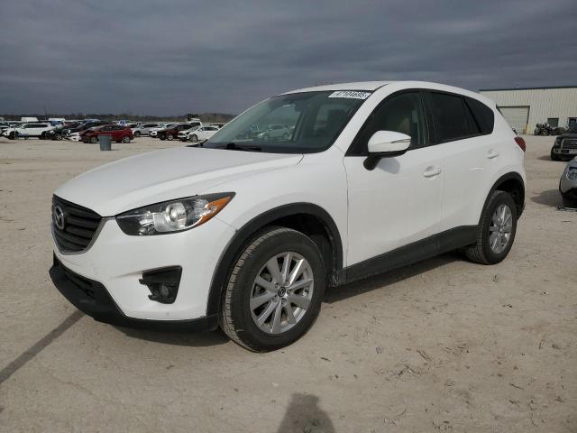 MAZDA CX-5 TOURI 2016 with VIN JM3KE4CY2G0633975 - Photo from auction