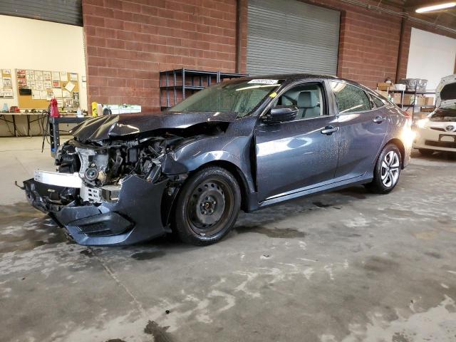 HONDA CIVIC LX 2018 with VIN 2HGFC2F55JH579615 - Photo from auction