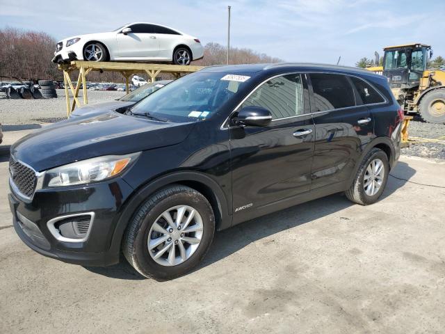 KIA SORENTO 2016 with VIN 5XYPGDA51GG144012 - Photo from auction