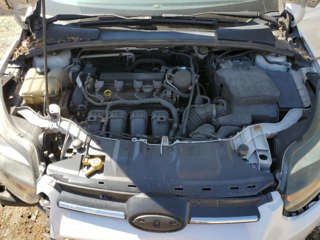 Photo 11 from auction – 2012 FORD FOCUS TITA with VIN 1FAHP3N24CL476738