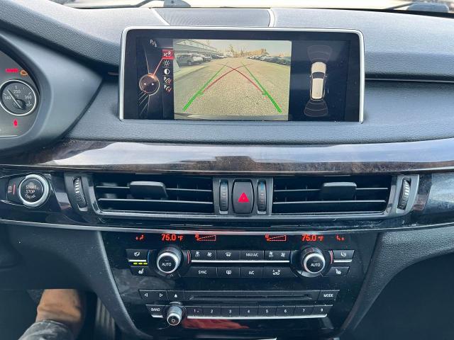 Photo 10 from auction – 2015 BMW X5 XDRIVE4 with VIN 5UXKR0C56F0P07620