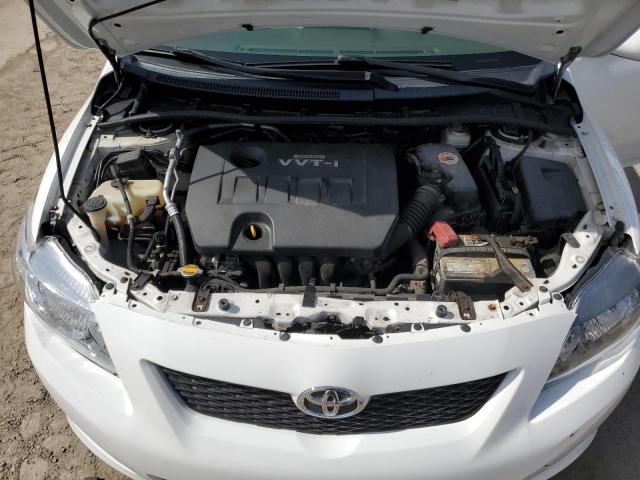 Снимка 11 от търг – 2009 TOYOTA COROLLA BA с VIN 2T1BU40E19C019580