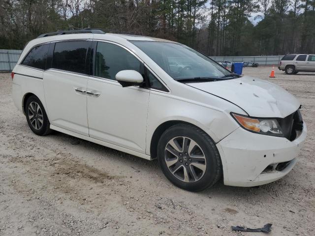 Photo 4 from auction – 2014 HONDA ODYSSEY TO with VIN 5FNRL5H99EB032887