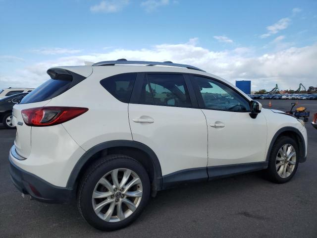 Photo 3 from auction – 2014 MAZDA CX-5 GT with VIN JM3KE2DYXE0380906