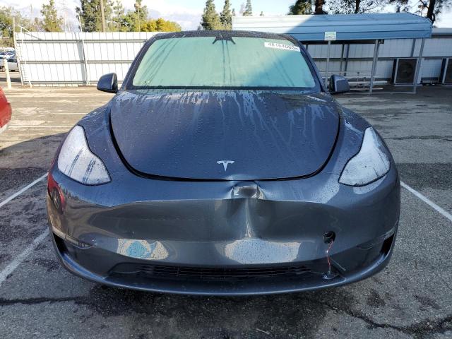 Photo 5 from auction – 2022 TESLA MODEL Y with VIN 7SAYGDEF2NF563713