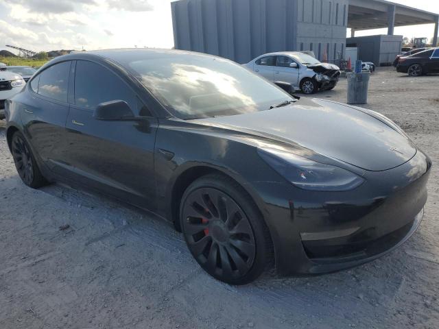Снимка 4 от търг – 2023 TESLA MODEL 3 с VIN 5YJ3E1ECXPF693419