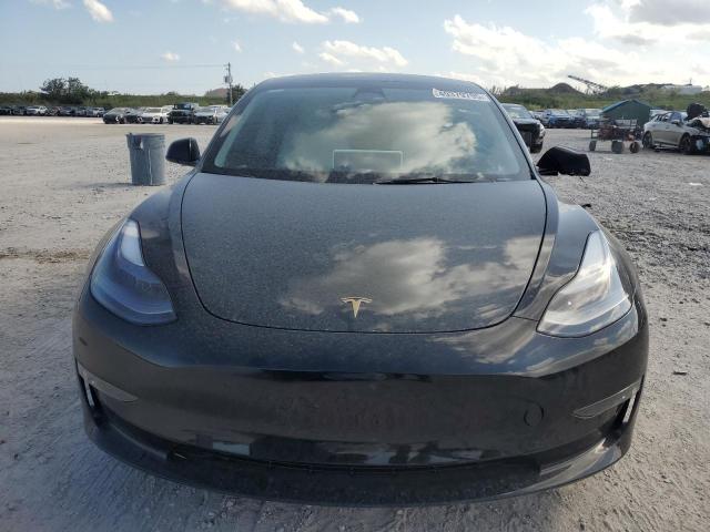 Снимка 5 от търг – 2023 TESLA MODEL 3 с VIN 5YJ3E1ECXPF693419