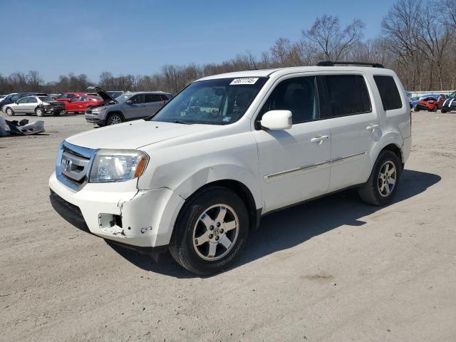 HONDA PILOT TOUR 2011 with VIN 5FNYF4H9XBB099992 - Photo from auction