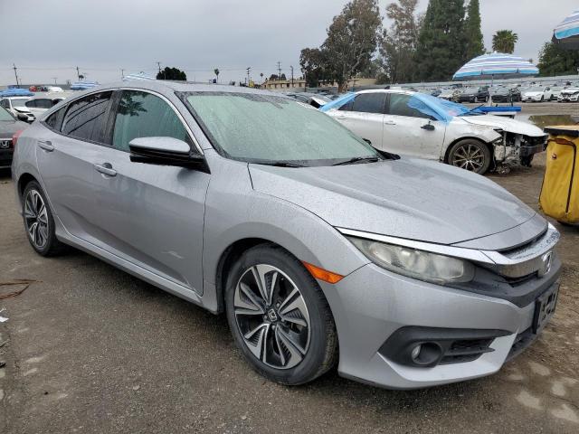 Photo 4 from auction – 2016 HONDA CIVIC EX with VIN 2HGFC1F36GH637071