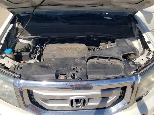 Photo 12 from auction – 2011 HONDA PILOT TOUR with VIN 5FNYF3H96BB026337