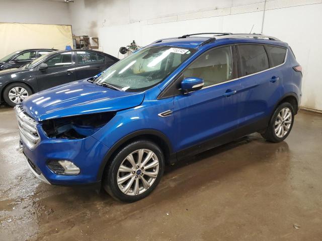FORD ESCAPE TIT 2017 with VIN 1FMCU0JD2HUD18852 - Photo from auction