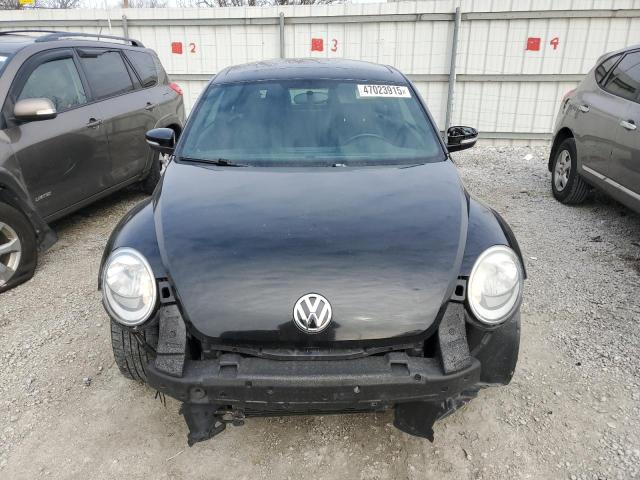 Photo 5 from auction – 2013 VOLKSWAGEN BEETLE with VIN 3VWJP7ATXDM619335