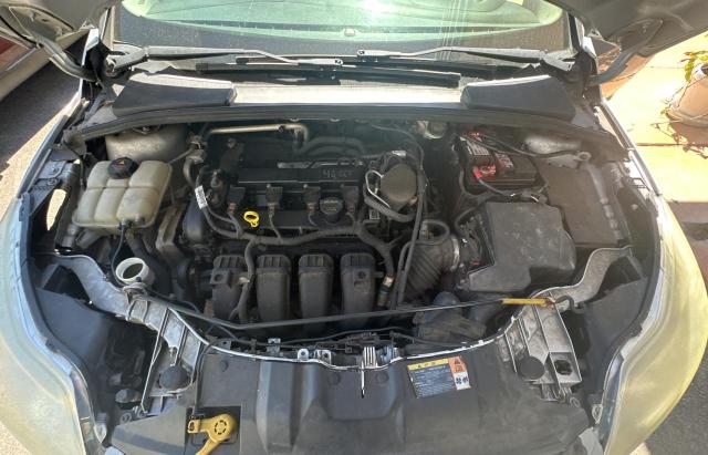 Foto 7 de la subasta – 2013 FORD FOCUS SE con VIN 1FADP3K2XDL378463