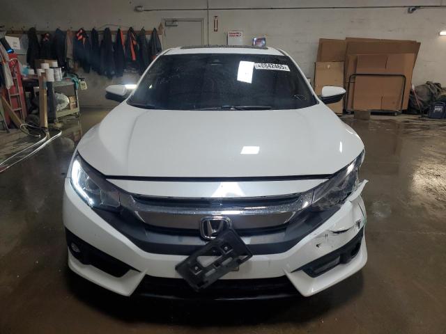 Photo 5 from auction – 2017 HONDA CIVIC EX with VIN 19XFC1F81HE025075