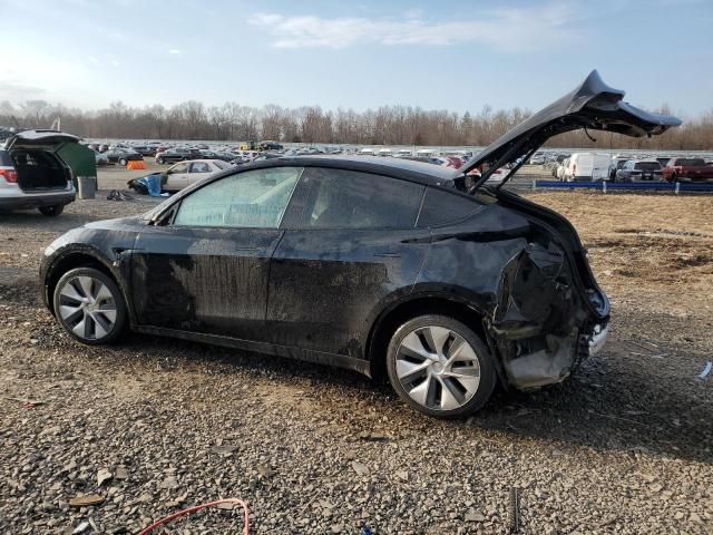 Photo 2 from auction – 2022 TESLA MODEL Y with VIN 7SAYGAEE5NF376911