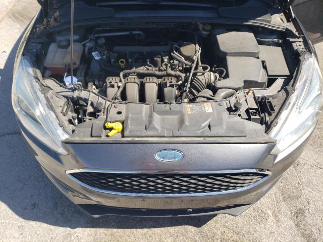 Снимка 11 от търг – 2015 FORD FOCUS SE с VIN 1FADP3F21FL330444